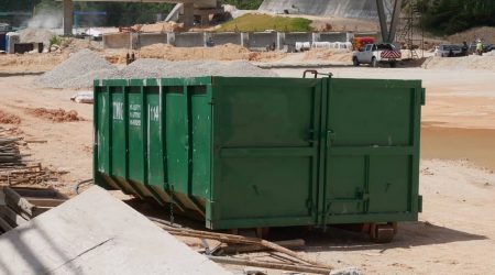 open top construction dumpster in Montgomery, AL